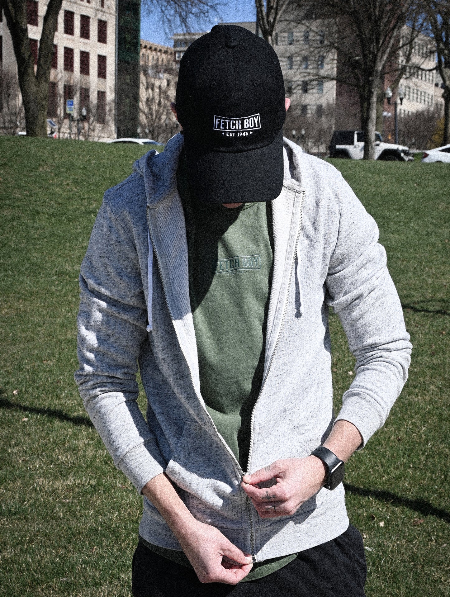 Fetch Boy Classic Baseball Dad Hat in Vintage Black wore at the Park.